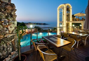 Breakfast, lunch served; local and international cuisine, pool views 