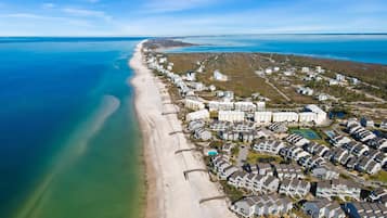 On the beach, sun-loungers