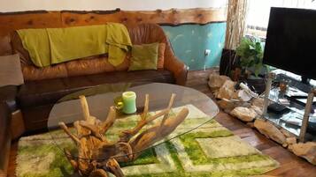 Comfort appartement, terras | Woonkamer | Flatscreentelevisie