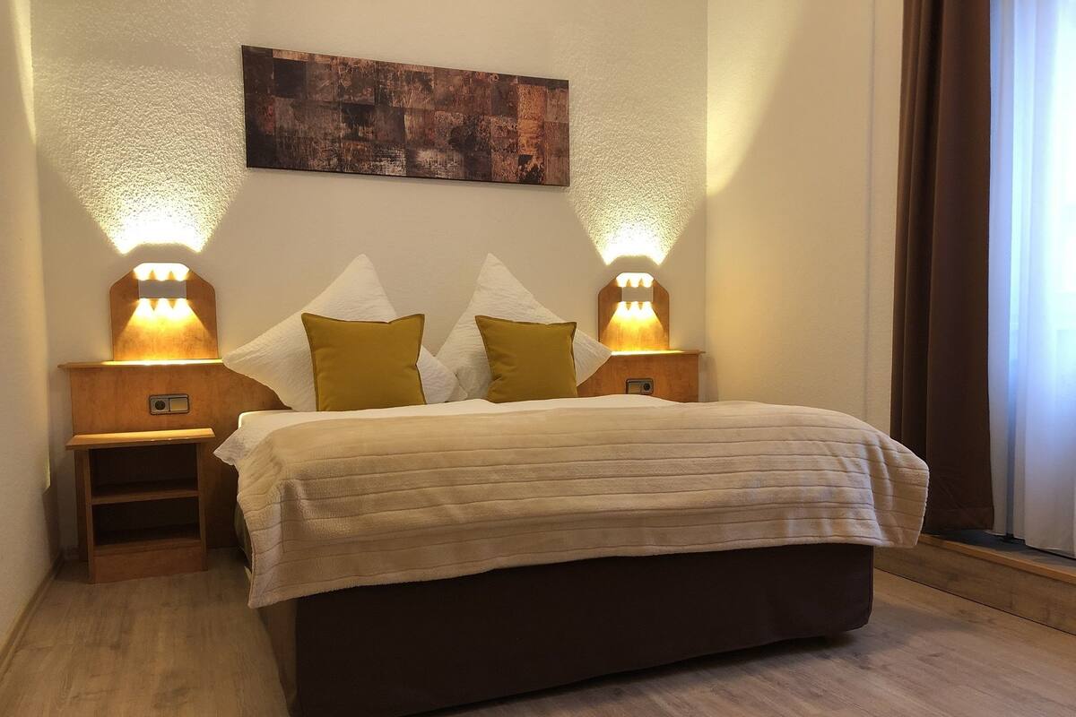 Comfort Suite, 1 Queen Bed, City View | In-room safe, WiFi (free), bed sheets