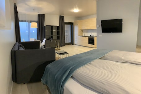 Comfort Studio Suite | Living room | Smart TV, Netflix, heated floors. Heima Holiday Homes