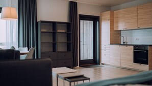 Family Studio Suite | Living area | 42-inch flat-screen TV with digital channels, Smart TV, heated floors - Heima Holiday Homes (Selfoss)