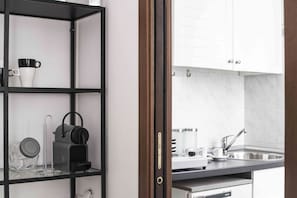 apartman, 1 hálószobával (Torino II) | Privát konyha | Hűtőszekrény, főzőlap, kávéfőző és főzőedények/tányérok/evőeszközök