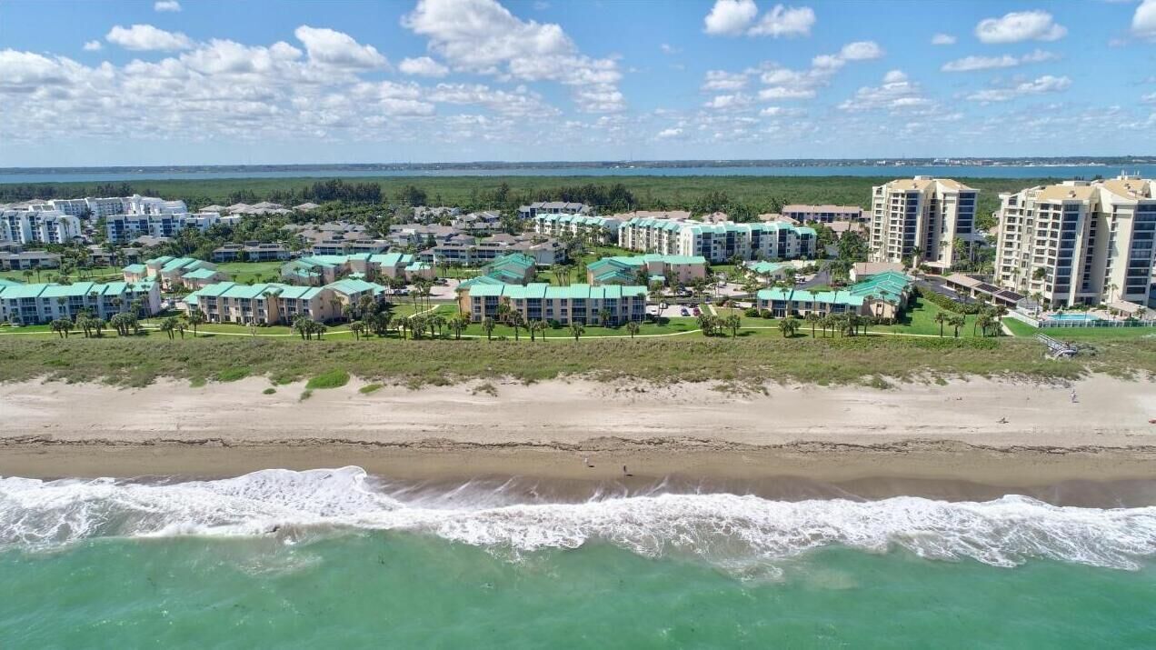 On the beach, sun loungers, beach towels