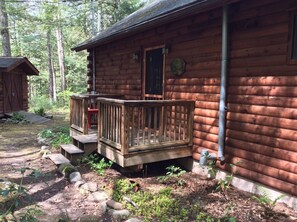 Escape to a secluded cabin surrounded by a serene forest, where you can unwind and connect with nature.