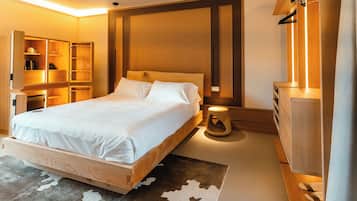 Premium bedding, down duvets, free minibar items, in-room safe