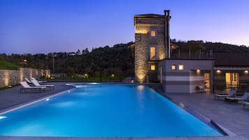 Seasonal outdoor pool, pool umbrellas, pool loungers