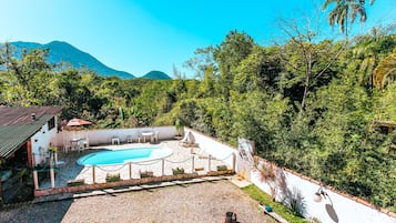 Outdoor pool, open 8:00 AM to 10:00 PM, pool umbrellas, sun loungers
