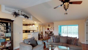 House, Multiple Beds (938 SW 6th Ct) | Living area | Flat-screen TV, DVD player, streaming services - 938 SW 6th Ct (Cape Coral)