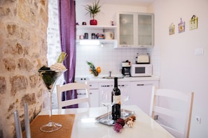 Apartment, 1 Bedroom | Private kitchenette | Fridge, microwave, stovetop, coffee/tea maker