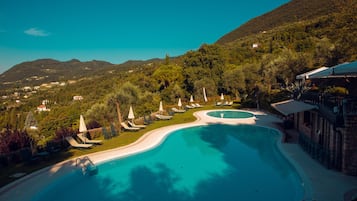 Outdoor pool, pool umbrellas, pool loungers