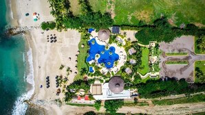 An aerial view of a resort with a beach, a swimming pool, and a parking area. - Beautiful Condo in Alamar with fabulous OCEAN VIEW (La Cruz de Huanacaxtle)