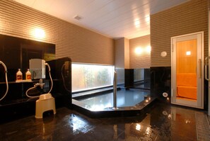 A spa room with a hot tub, a massage chair, and a sauna. - Ab Hotel Mikawa Anjo Minamikan (Anjo)