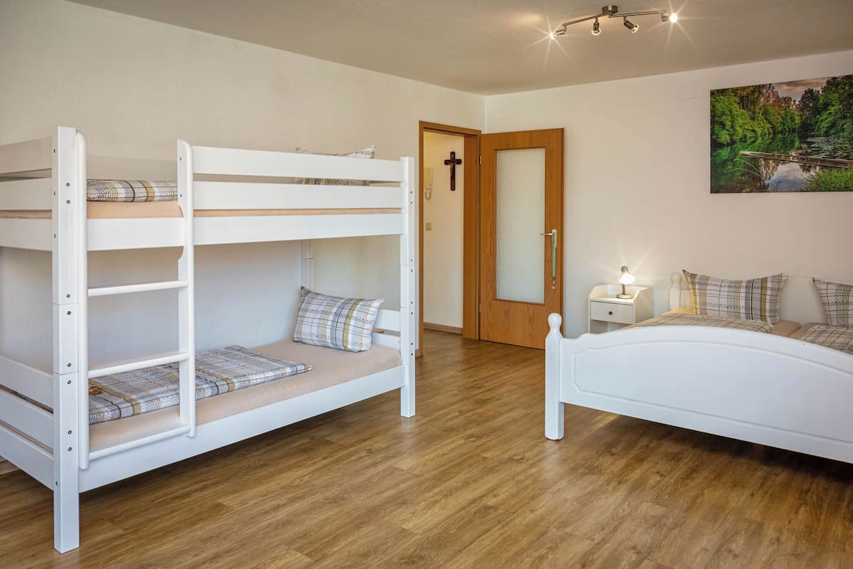 Basic Apartment, Multiple Beds | Living area | Flat-screen TV