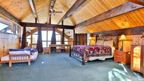 Bedroom 1: loft-style primary suite with King bed