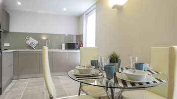 Business-Apartment, Mehrere Betten | Eigene KĂŒche