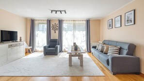 Apartment (12 - Czopowa 14) | Living area | Flat-screen TV - Apartamenty Sun & Snow Old Town Gdańsk (Gdansk)