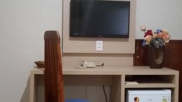 Frigobar, cortinas blackout, Wi-Fi de cortesia, roupa de cama