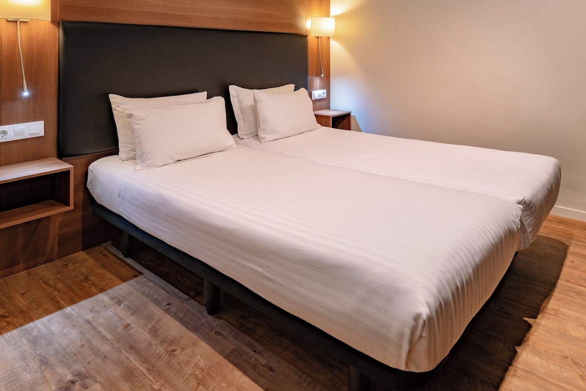 Chambres insonorisées, fer et planche à repasser, Wi-Fi gratuit