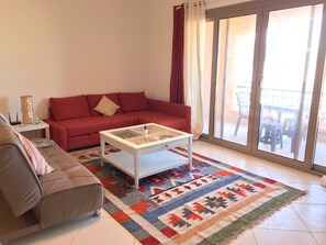 Appartement, 1 chambre | Aire de séjour | Téléviseur à écran plat
