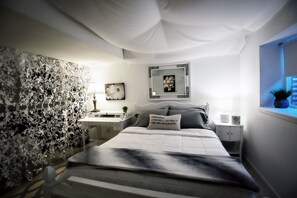 1 bedroom, desk, iron/ironing board, travel crib