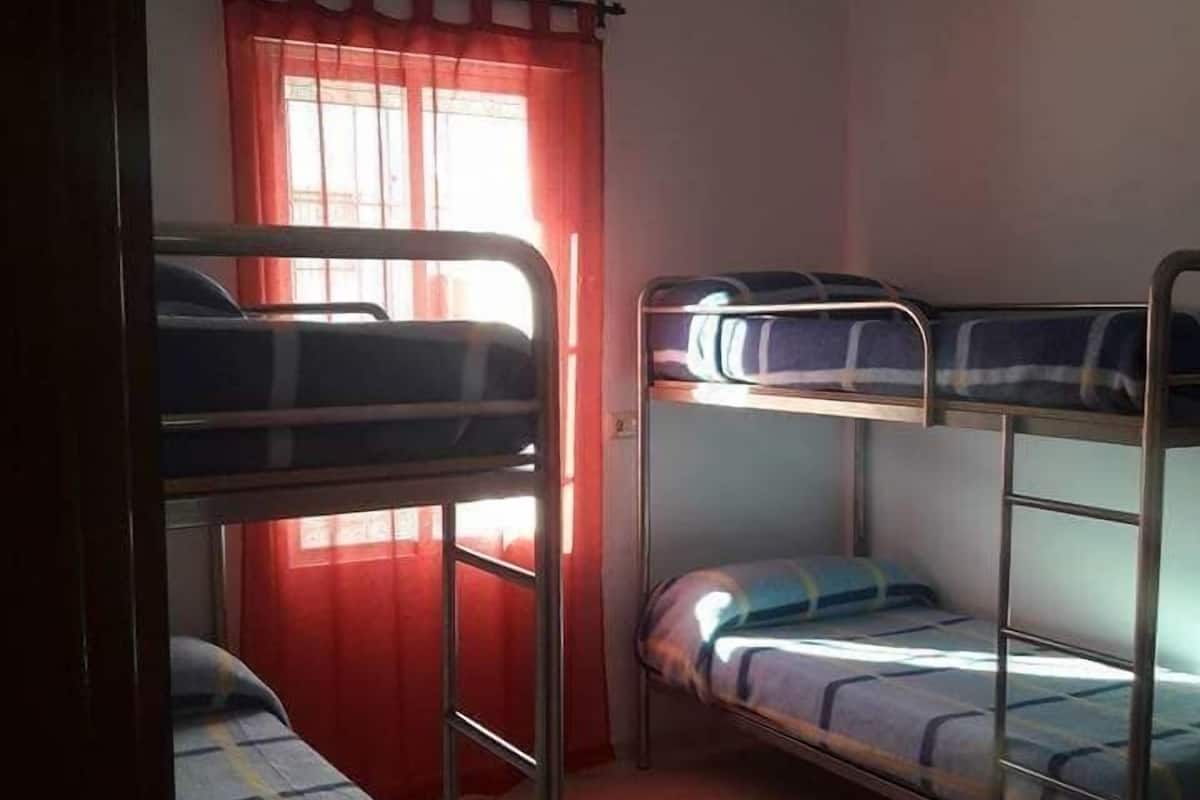 Quadruple Room, Shared Bathroom | WiFi (free), bed sheets