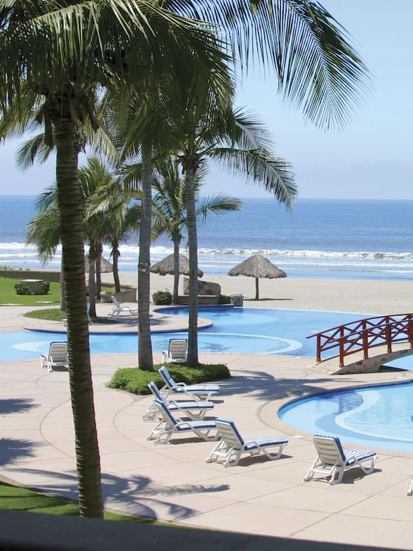 Outdoor pool, open 7:00 AM to 9:00 PM, pool umbrellas, sun loungers