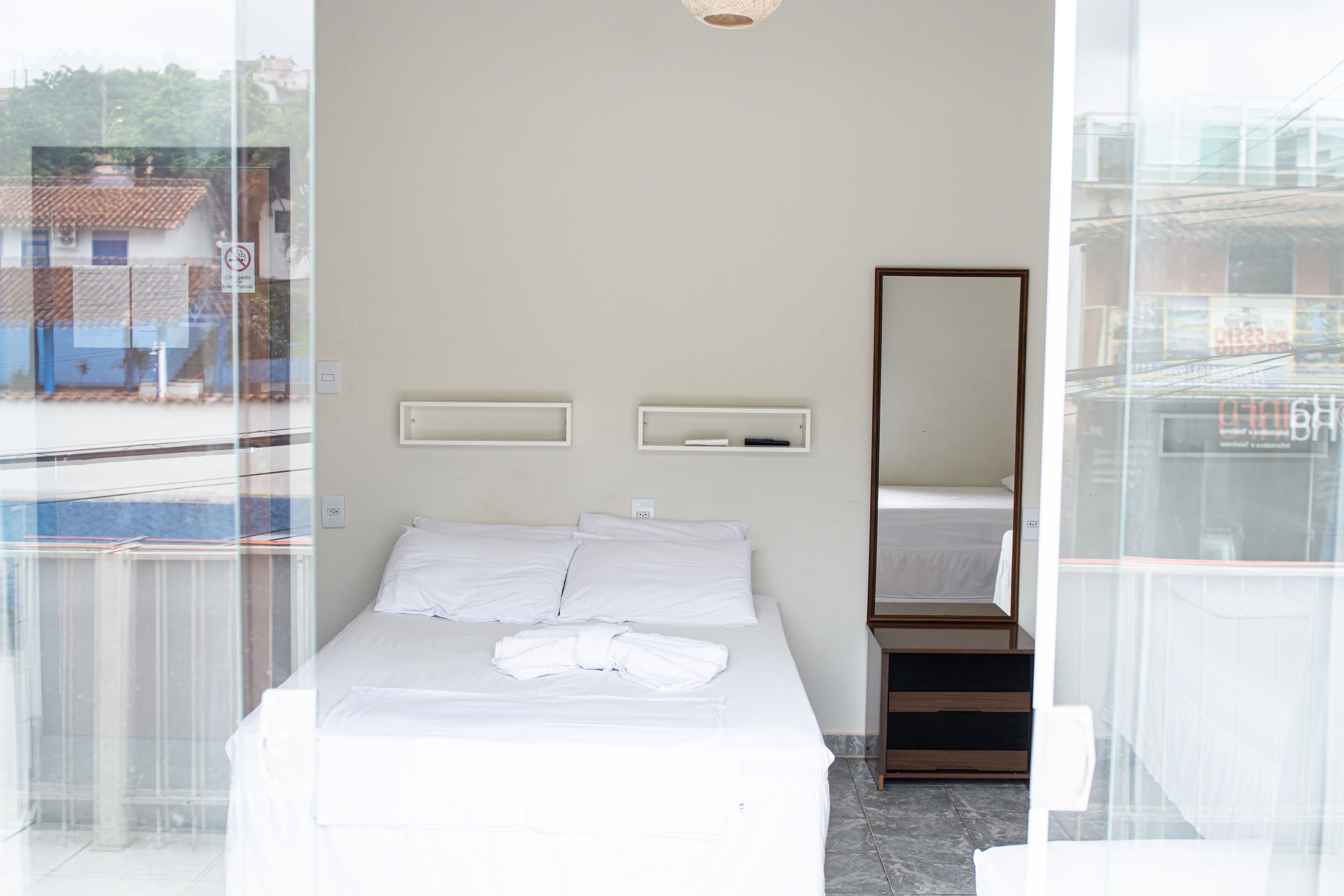 Quarto quádruplo premium | Frigobar, cortinas blackout, Wi-Fi de cortesia