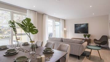 City House, 4 Bedrooms, City View | Living area | Flat-screen TV