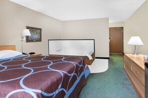 Suite, 1 Queen Bed, Jetted Tub | Desk, laptop workspace, blackout drapes, free WiFi