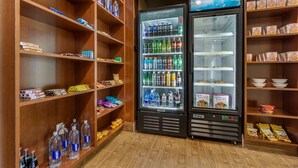 A vending machine area with drinks and snacks. - Comfort Inn & Suites Lakewood by JBLM (Lakewood)