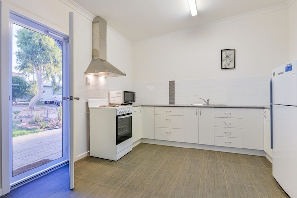 Fridge, microwave, toaster, cookware/dishes/utensils