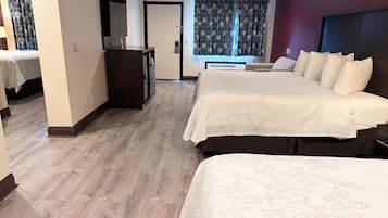 Suite, Multiple Beds, Non Smoking | Desk, laptop workspace, blackout drapes, iron/ironing board