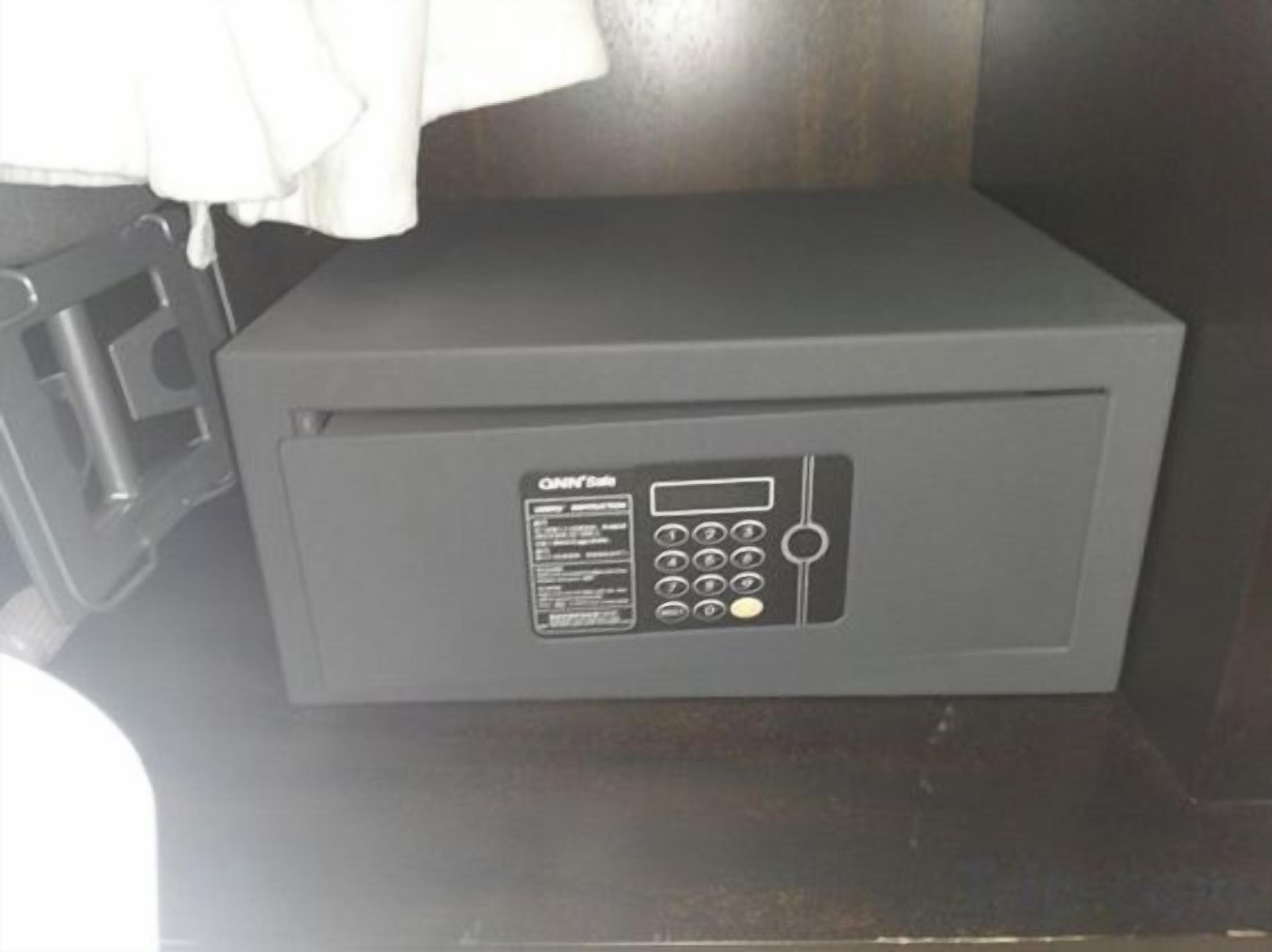A microwave with a control panel, located in a kitchen area.