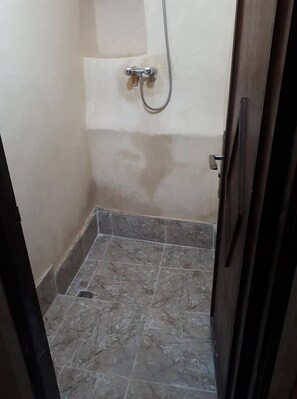 Shower, rainfall showerhead, towels, soap