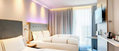 Chambre triple Standard | SystĂšme dâinsonorisation, accĂšs au Wi-Fi (inclus), literie fournie