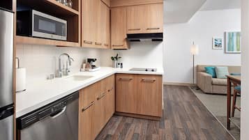 Suite, 1 King Bed with Sofa bed, Corner | In-room safe, desk, laptop workspace, soundproofing