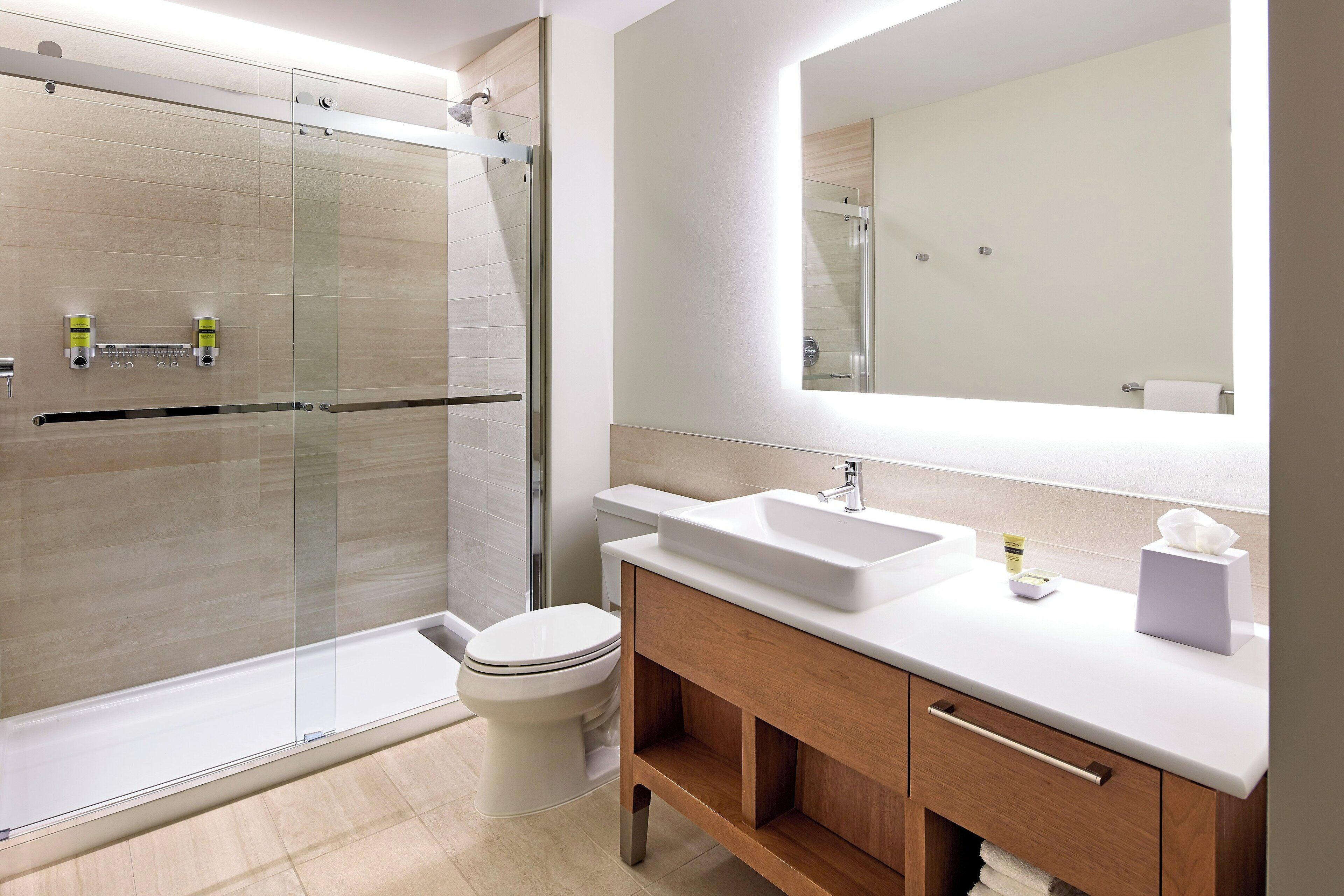 suite, 1 king bed with sofa bed, corner | bathroom | free toiletries, hair dryer, towels, soap