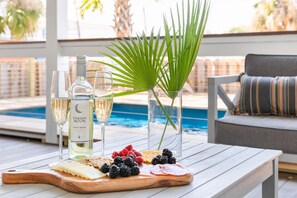 A heated pool - Charming Folly Bungalow | Pool, Porches & Walk to Beach + Center Street (Folly Beach)