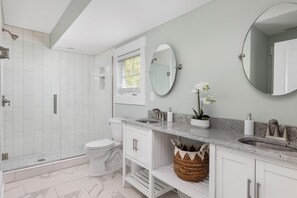 Combined shower/tub, hair dryer, towels, soap