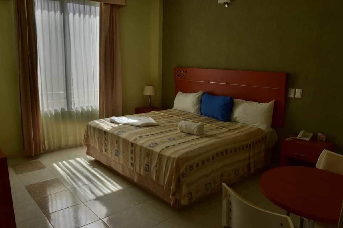 Basic Room, 1 Queen Bed | Desk, blackout curtains, iron/ironing board (on request), bed sheets