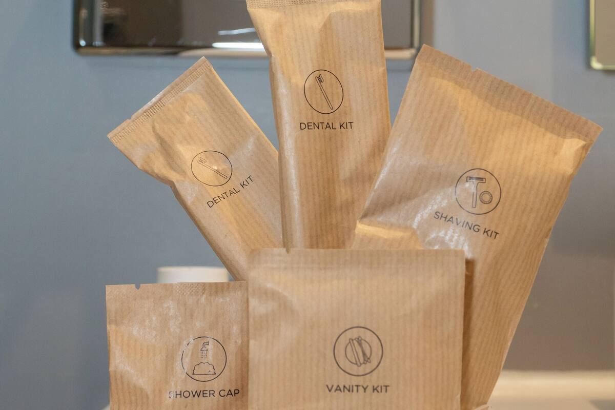 junior suite, 1 king bed | bathroom | eco-friendly toiletries, hair dryer, slippers, towels