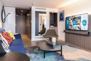 Executive Suite, 1 King Bed with Sofa bed, Non Smoking, Sea View | Living area | Flat-screen TV - Novotel Deauville Plage (Deauville)