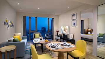 Executive Room, 1 Bedroom | Living area | LED TV, DVD player