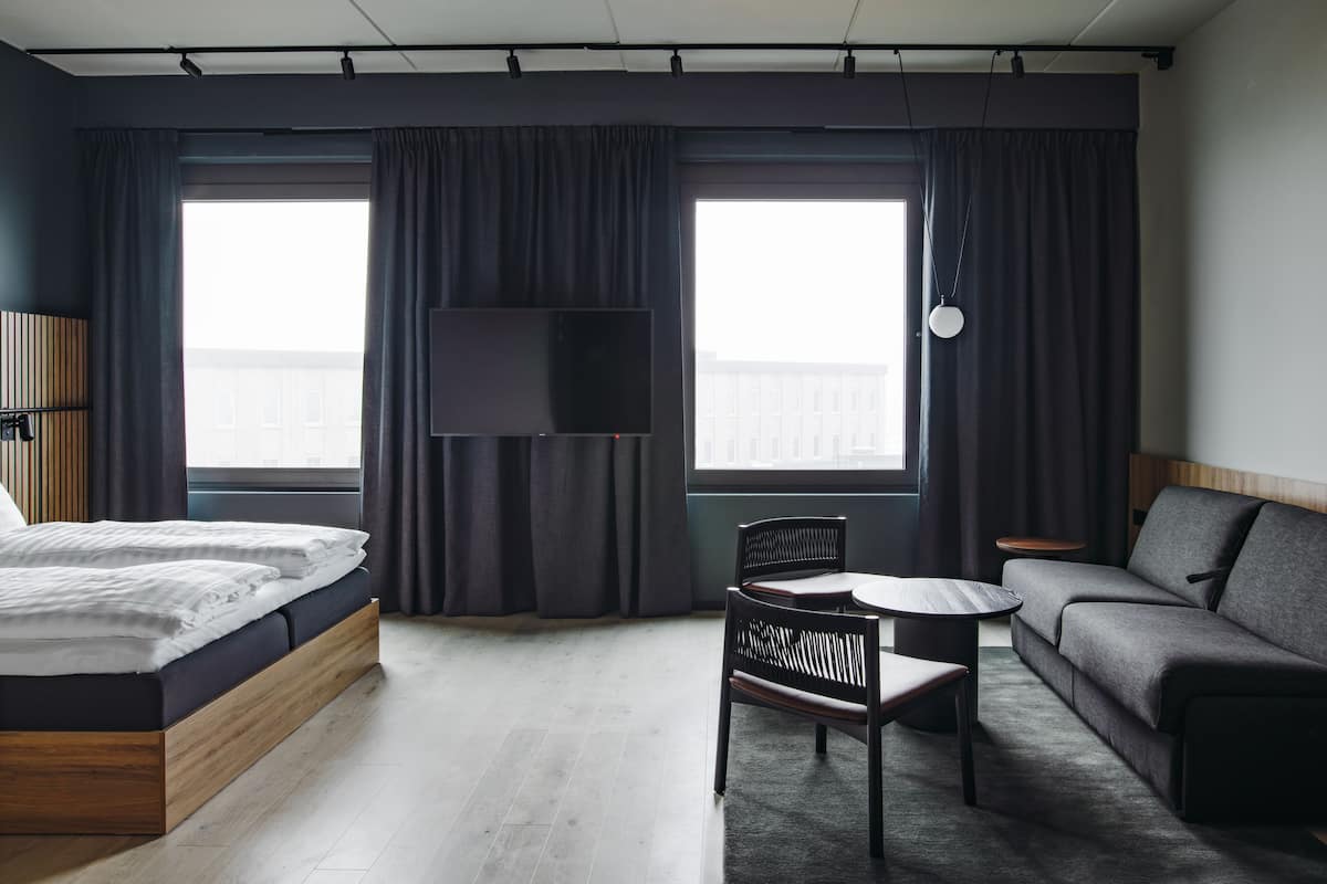 Habitació Deluxe (Family) | Roba de llit hipoal·lergògena i cortines opaques 