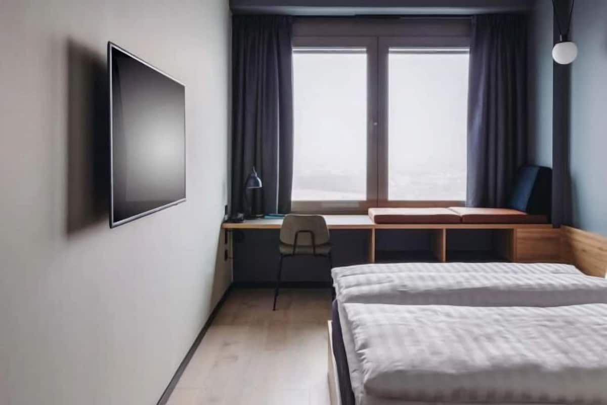 Blackout curtains, soundproofing, free WiFi, bed sheets