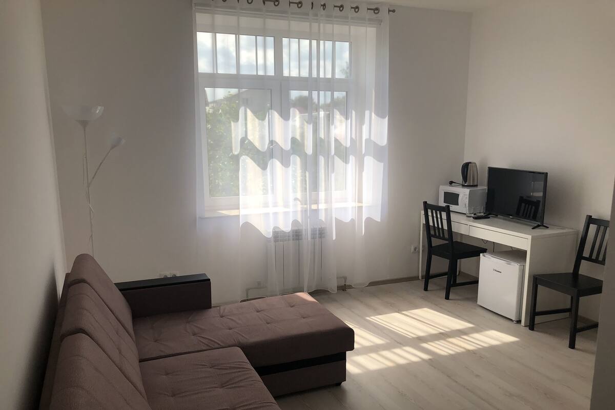 Family Triple Room, 1 Double Bed with Sofa bed, City View | Living area