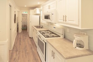 Cottage, 2 Bedrooms (No Linens Provided) | Private kitchen | Full-size fridge, microwave, oven, stovetop -  Sun Outdoors Old Orchard Beach Downtown (Old Orchard Beach)