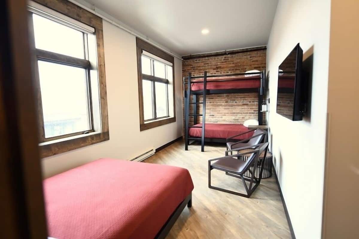 Room 5 @ 30 W Main Street | Premium bedding, individually decorated, individually furnished