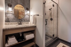 Room 15 @ 102 West Main Street | Bathroom | Shower, hair dryer, towels - Crosby Lofts (Crosby)